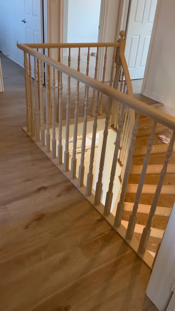 Wood flooring and stair railings in a home