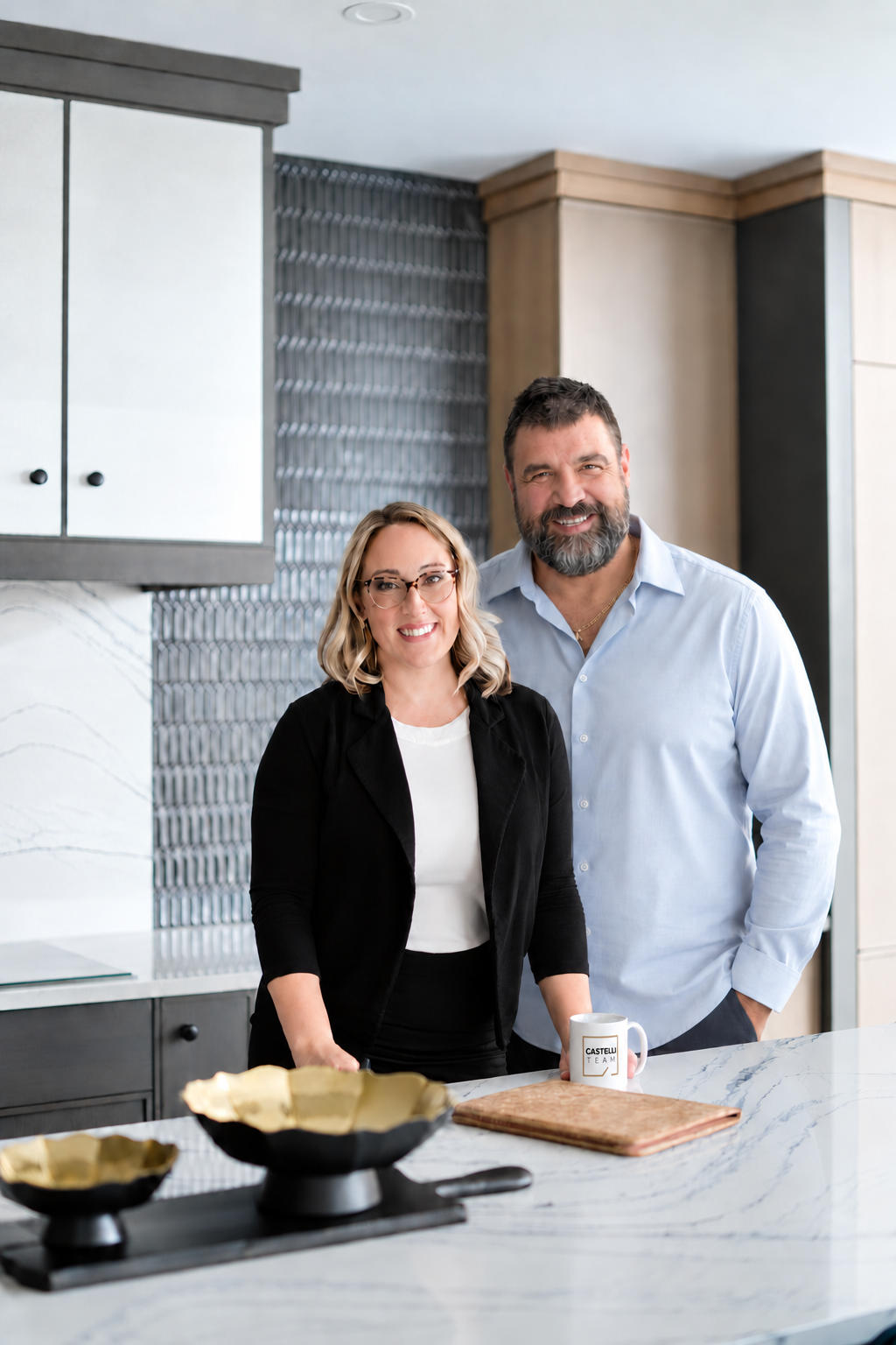 Lindsay and Bryan Castelli together in a kitchen